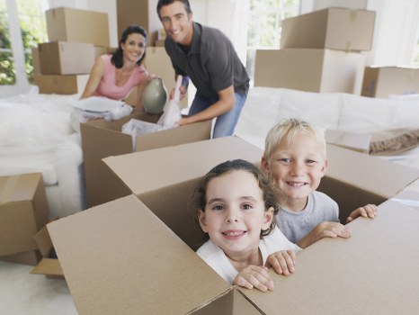 Customer and movers reviewing service terms before relocation