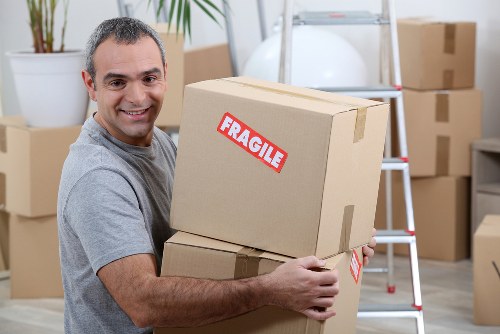 Removal team handling house move items in Croydon