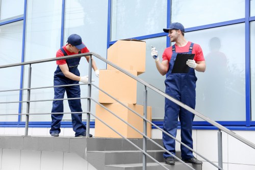 Removal team planning a move in a Croydon residential street