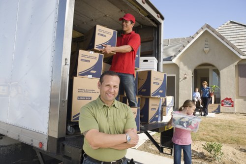 Removal van and moving crew handling a residential move in Croydon