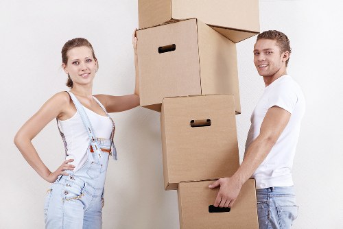 Local house movers handling boxes and furniture during a Croydon move